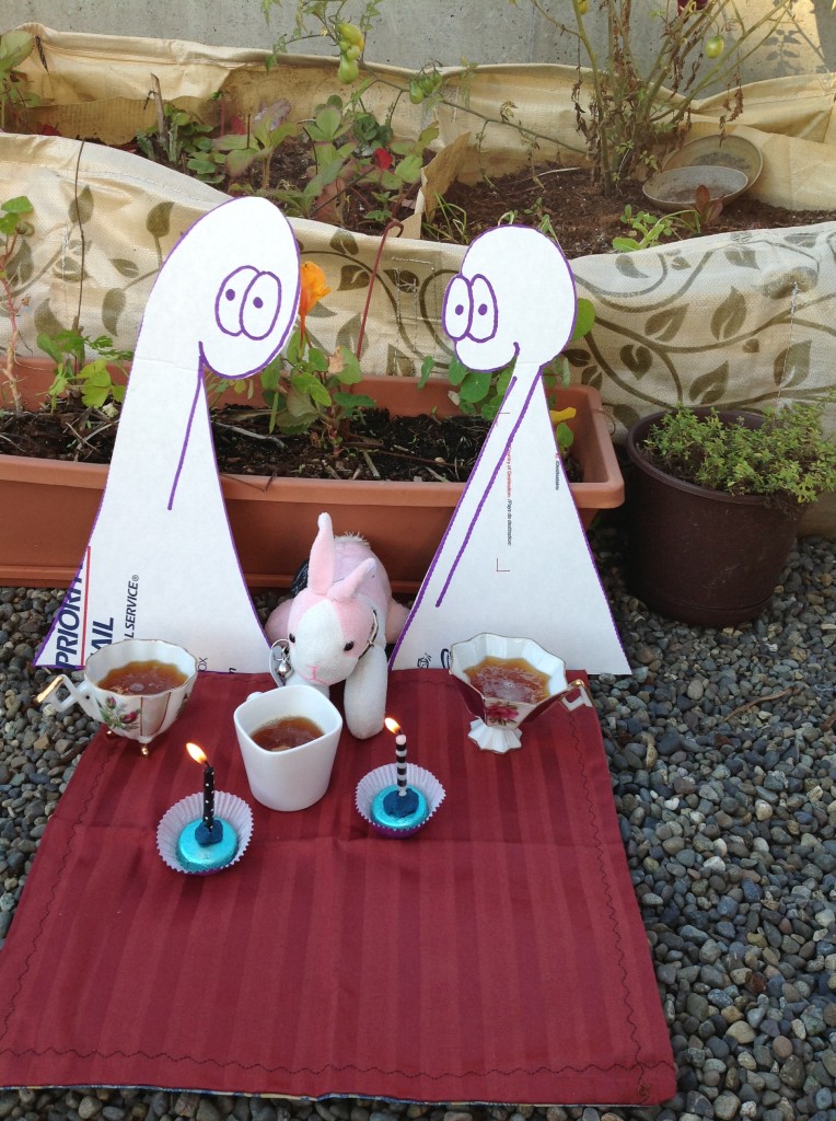 The Things and Bunson enjoying afternoon tea out by the portable garden on our balcony.